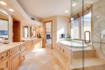 Master Bathroom features Tub and Glass Shower, Double Vanity and Walk in Closet